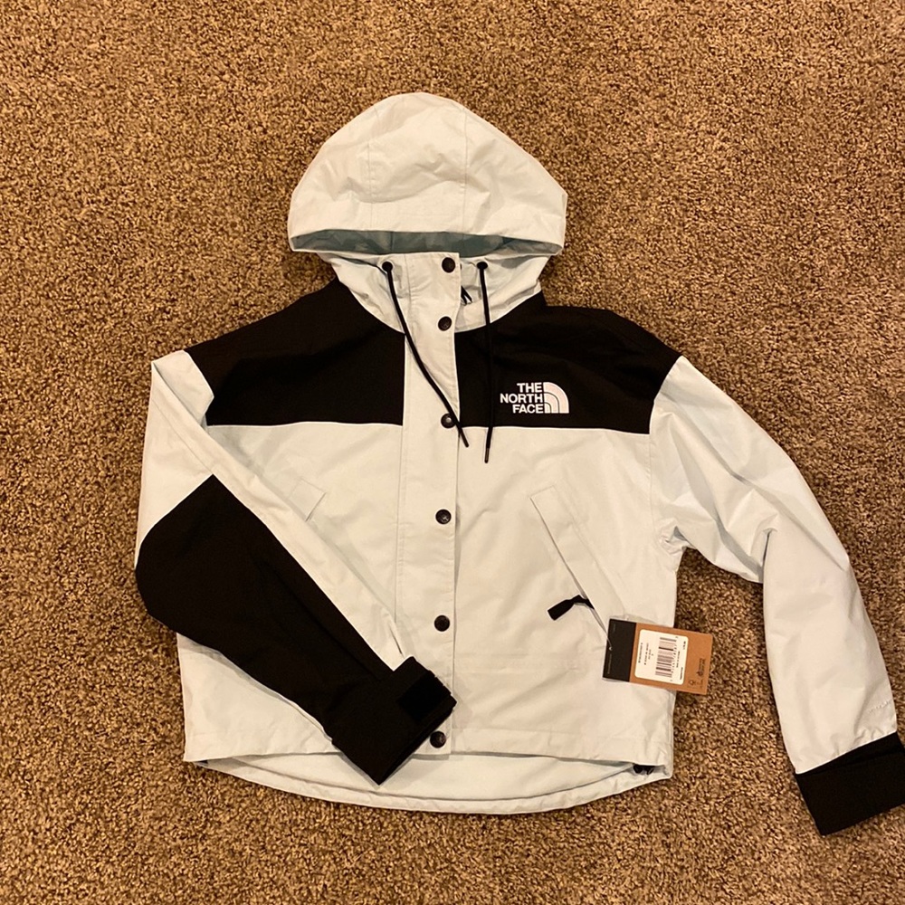 cropped icy blue & black north face rain jacket size small